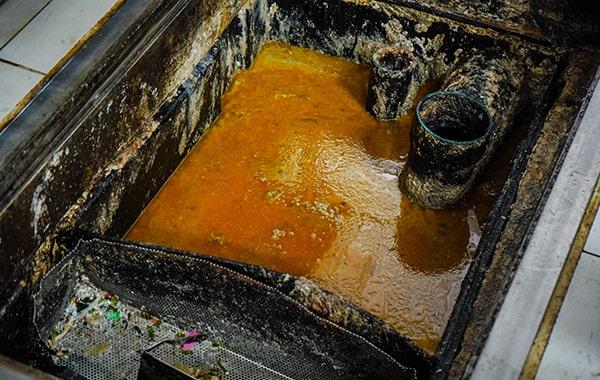 neglecting grease trap cleaning can lead to clogs, foul odors, and even fines from local authorities